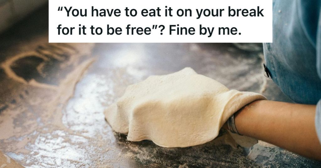 Worker making a pizza