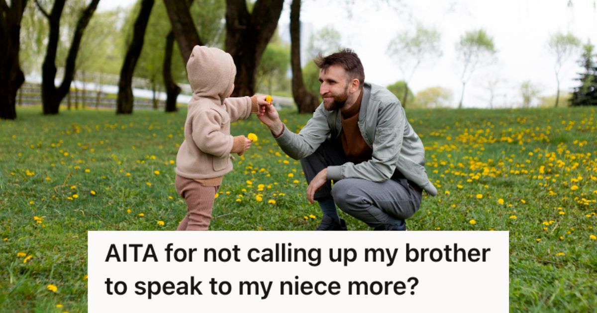 Toddler giving small flower to a man in the garden