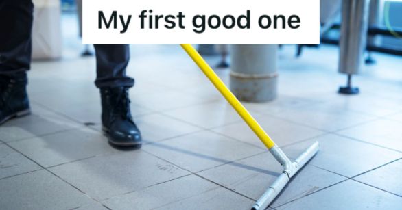 Worker sweeping the floor of an industrial floor