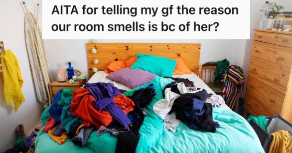 A messy room with a bed full of laundry