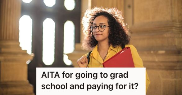Woman carrying books in university
