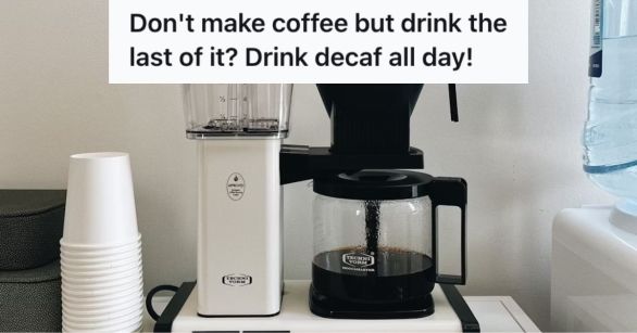 Coffee maker machine in with brewed coffee in the pot