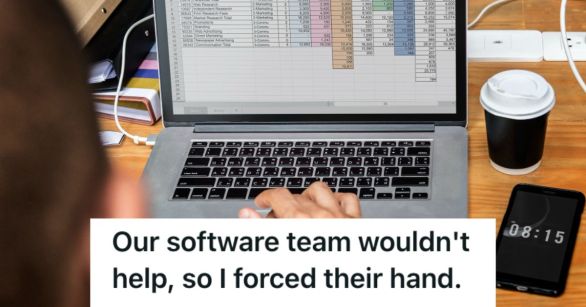 An employee working on a spreadsheet in their laptop