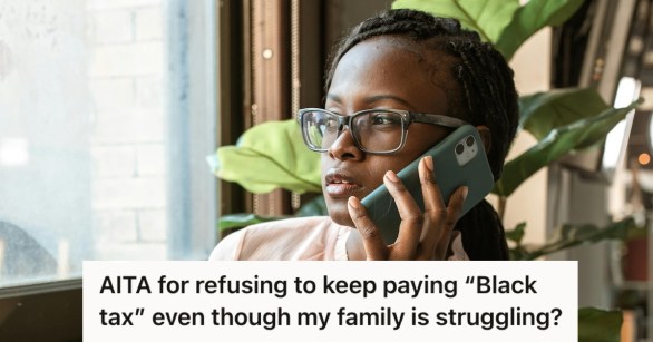African woman with a serious face on a phone call