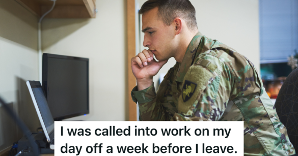 army soldier looking at a computer