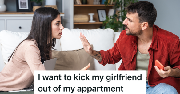 couple sitting on a couch arguing