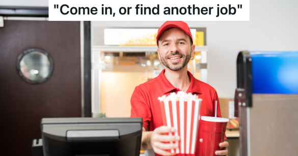 movie theater employee holding popcorn and a drink