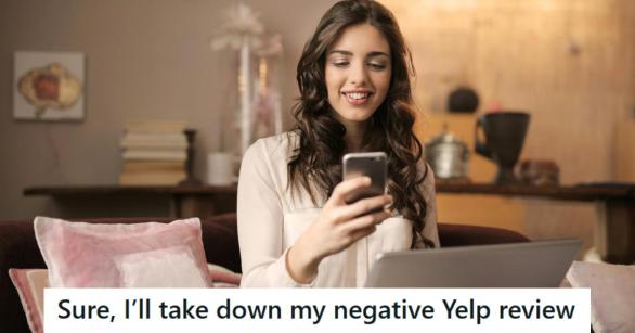 Woman smiling at the phone after winning her claim