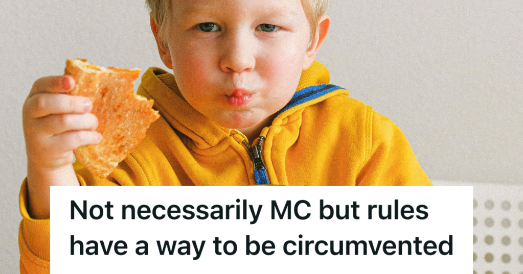 kid in yellow jacket eating a sandwich