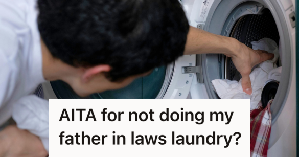 man putting laundry in a washing machine