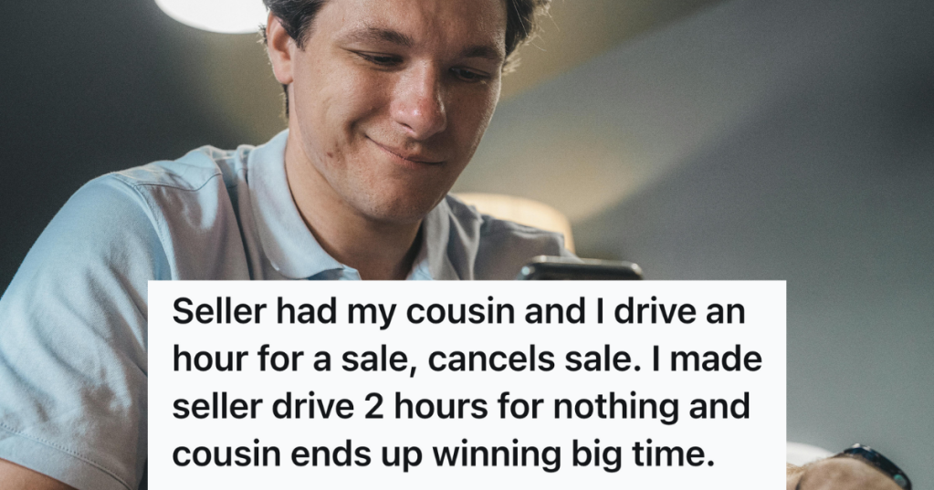 man smirking on his phone