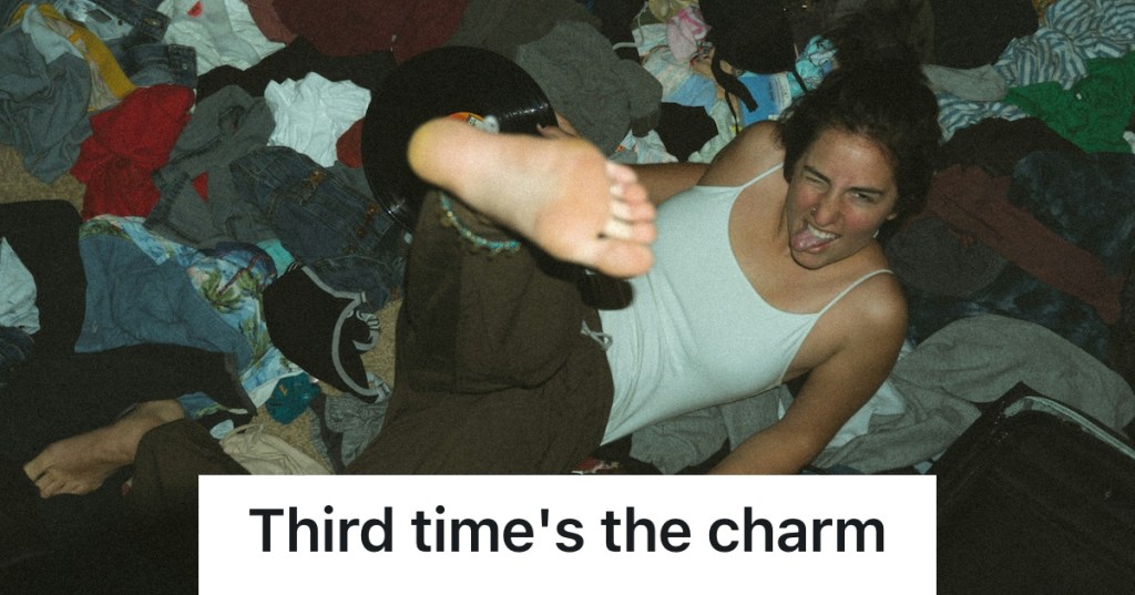 guy kicking the camera on bed of dirty clothes