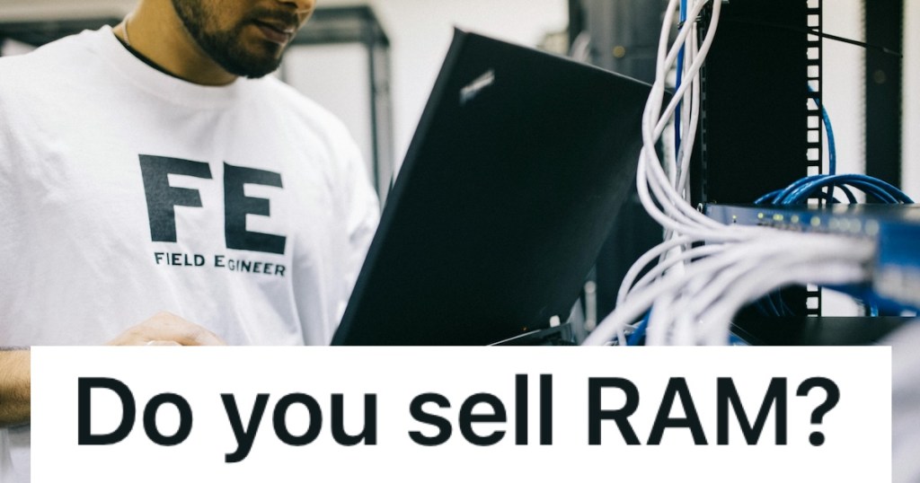 man studying computer screens