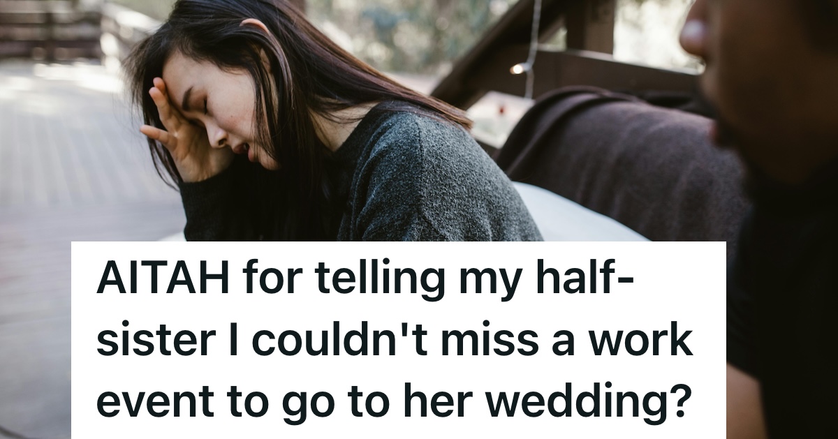 woman holding her head looking upset