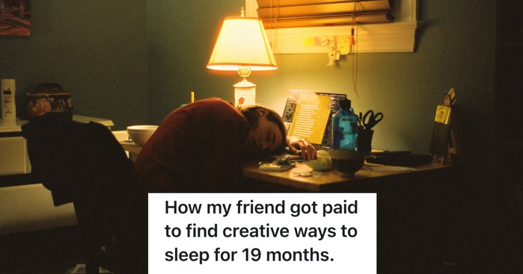 man sleeping at his desk