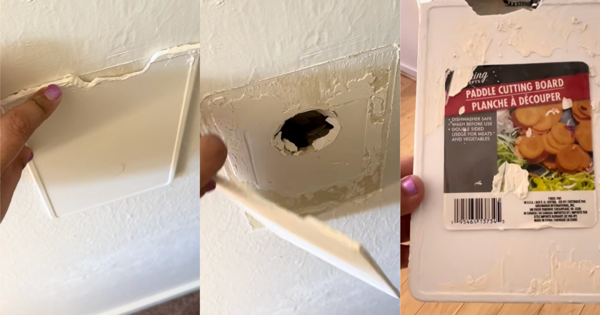 cutting board over a hole in a wall