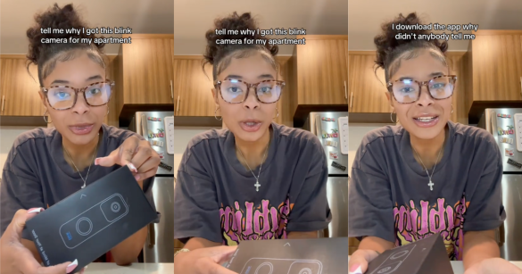 woman holding a doorbell camera