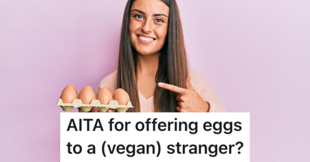 woman holding a carton of eggs