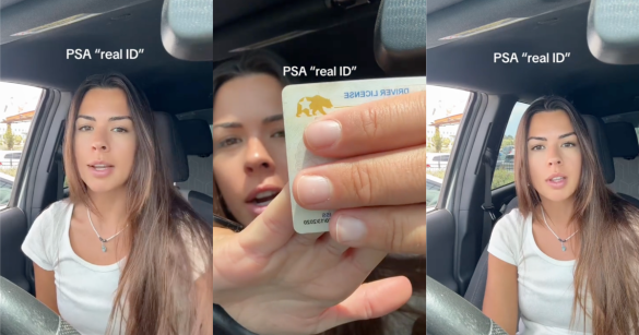 woman holding a real id