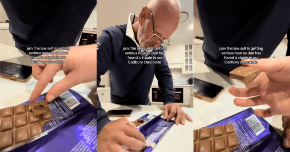 man opening a chocolate bar