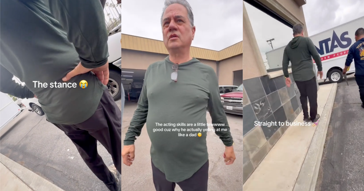 man at a car dealership