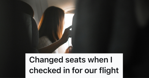 woman looking out a plane window