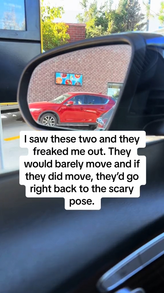 A couple sitting in a car