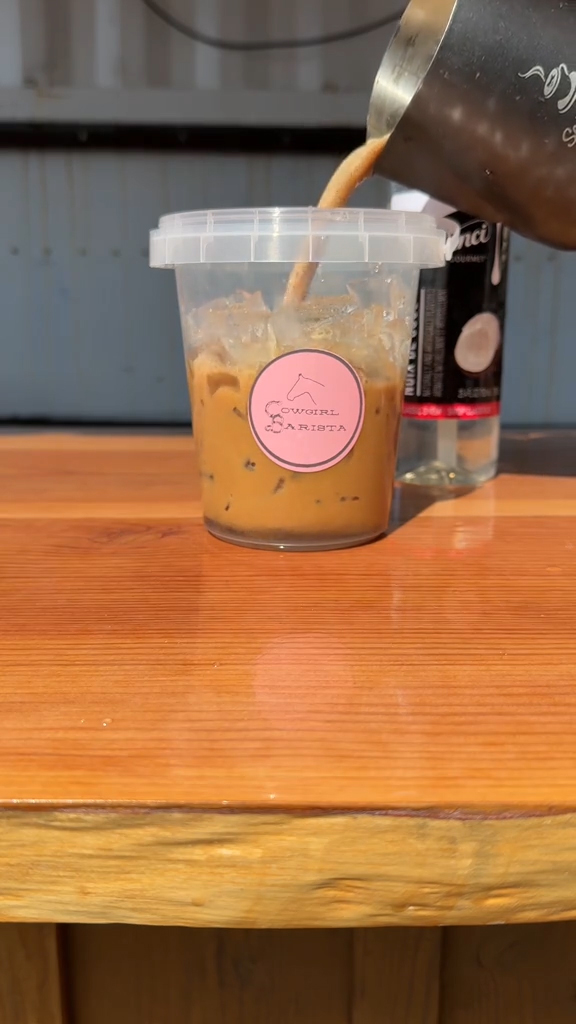 Cowgirl Barista making a bucket of iced coffee