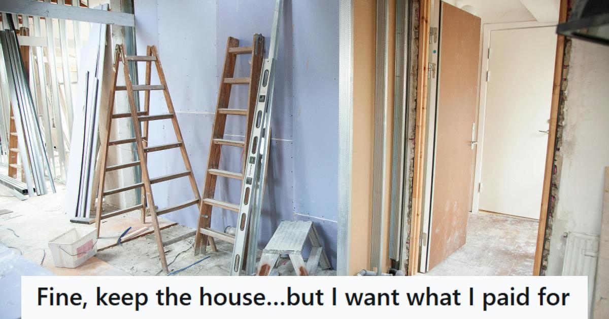 Ladders and other tools sitting inside an unfinished house