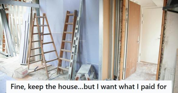 Ladders and other tools sitting inside an unfinished house
