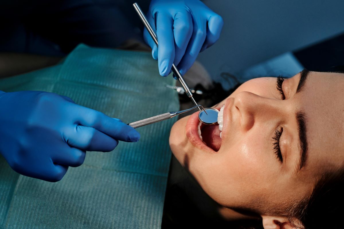 A woman having a dental examination