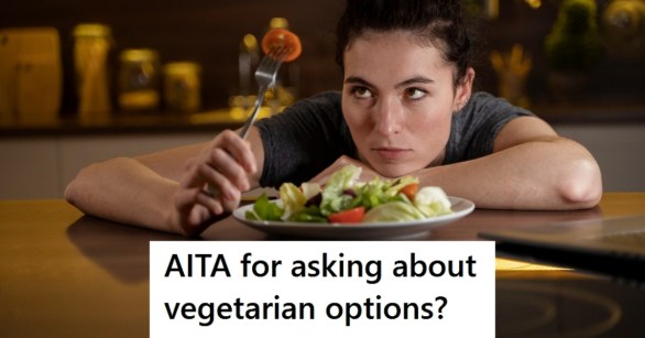 Woman eating salad looking at fork
