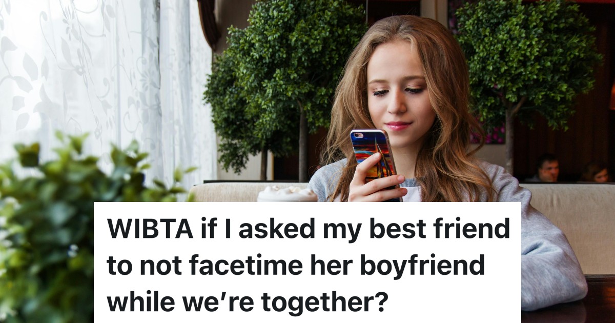 Girl on phone in cafe