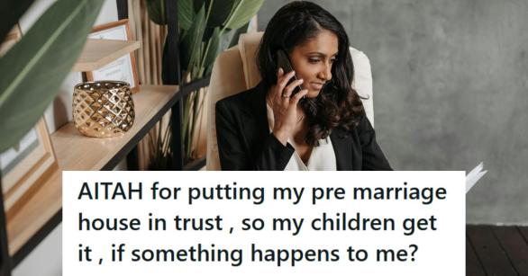 Ethnic woman sitting on the phone to her trust lawyer
