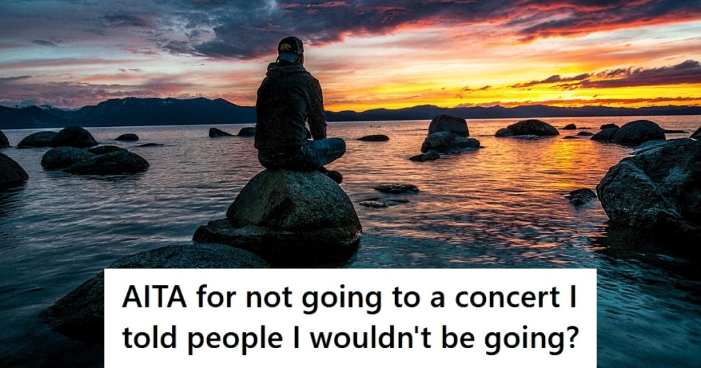 Man sitting on a rock at beach