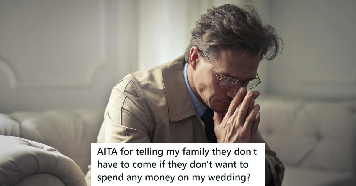 Man sitting sadly on a couch 