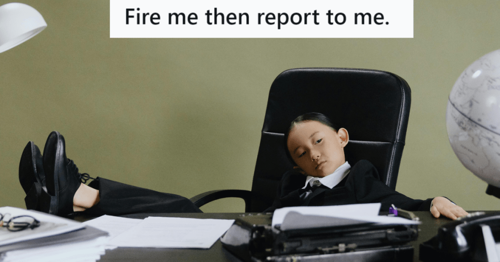 Little girl sitting on a desk like a boss