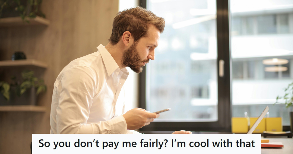 Man in white shirt working on a desk
