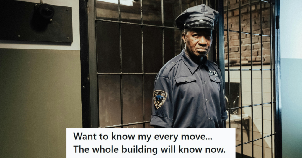 Jail officer standing outside of a jail cell