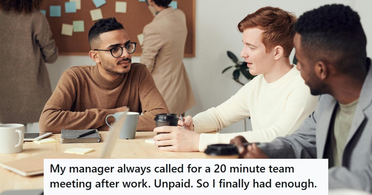 Three men sitting on a table in an office