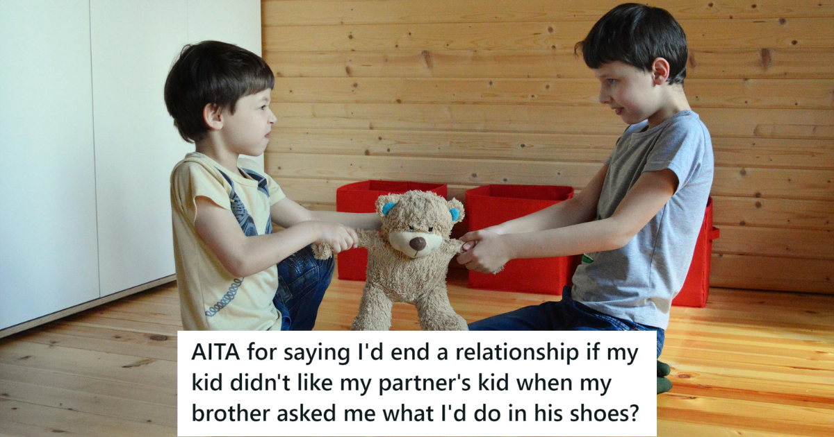 Two young boys fighting over a stuffed toy.