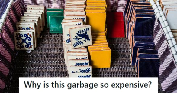 Hand painted tiles on display in a basket