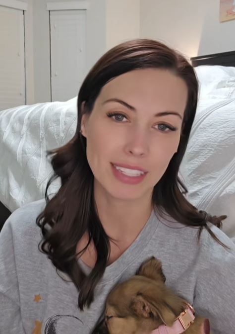 Woman holding a puppy