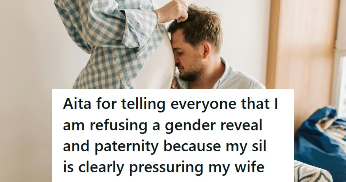 Man putting his head on his pregnant wife's belly