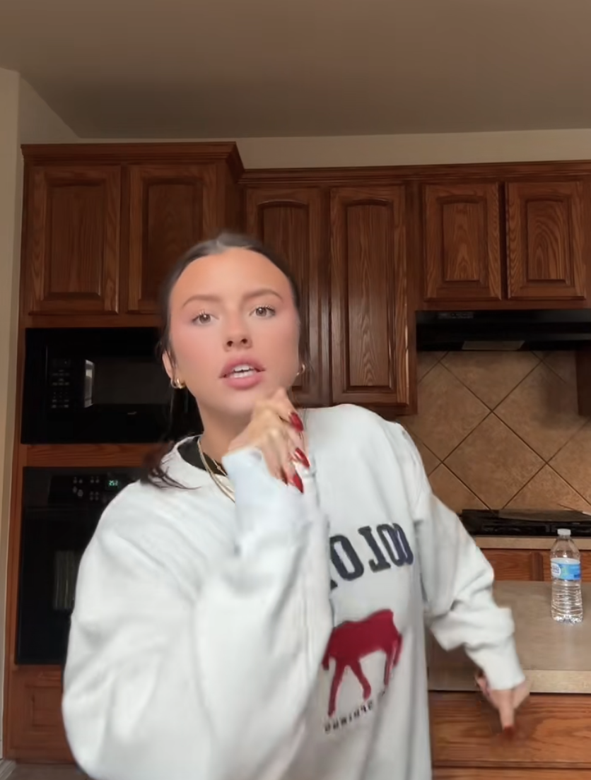 A woman speaking passionately