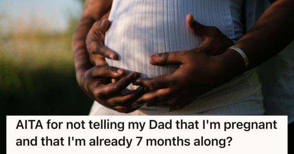 Man and woman holding pregnant belly