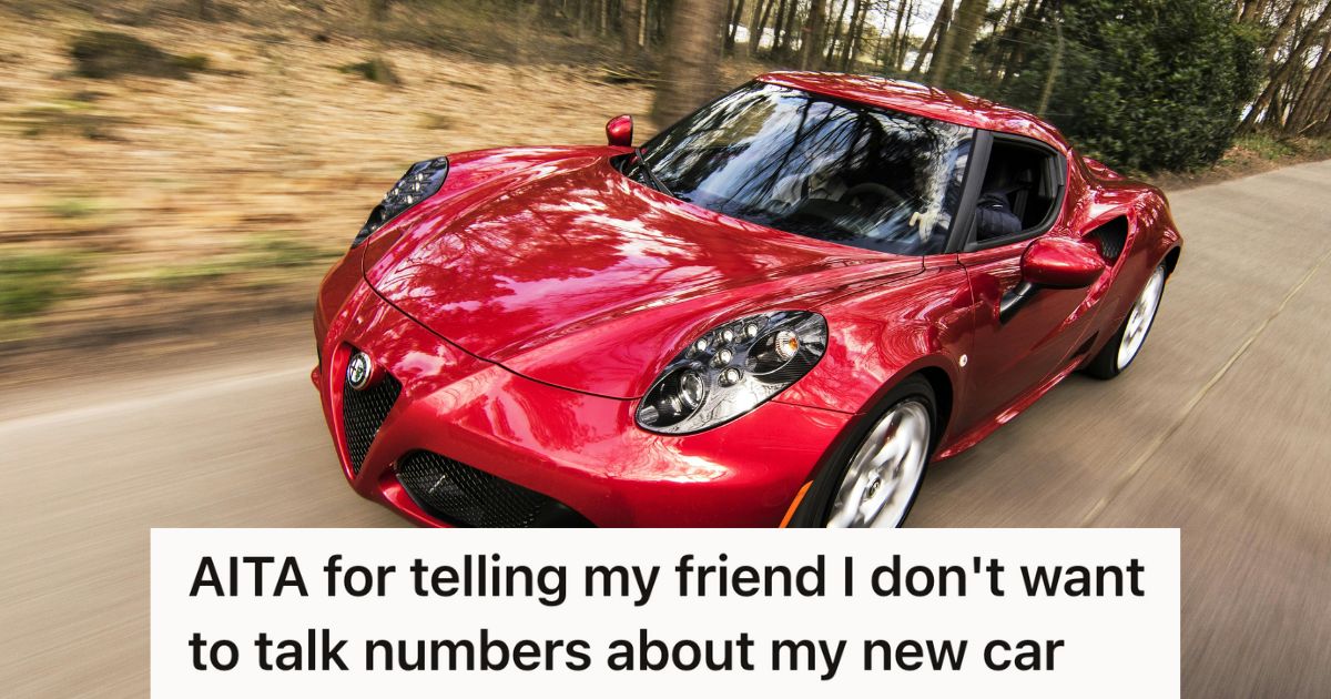 Sports car driving down a road.