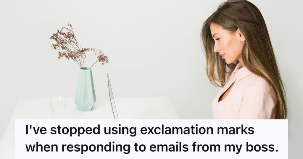 Woman typing on laptop and smiling