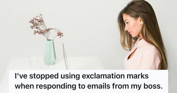 Woman typing on laptop and smiling