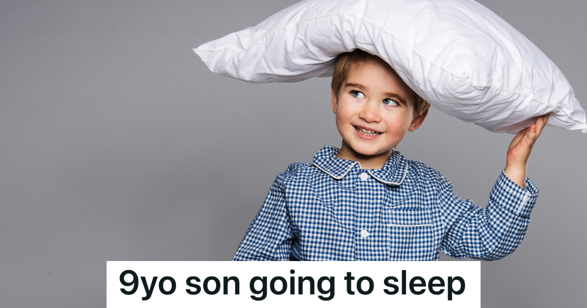 boy in pjs holding a pillow on top of his head